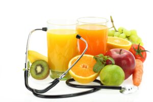 fruits fructose 300x200 - Healthy eating. Fruits, vegetables, juice and stethoscope