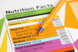 nutrition facts 300x200 - Nutrition facts and ballpoint pen. Close-up.